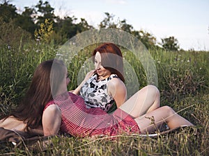 Two young girls on a rest outdoors