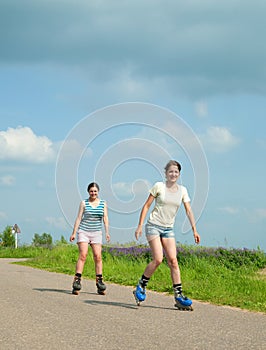 Two Young girls on roller blades