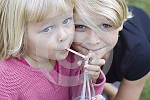 Two young girls sharing