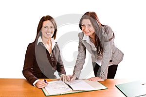 Two young ladies at desk