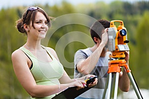 Two young land surveyors