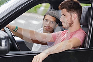 Two young men on car trip