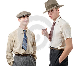 Two young men with clothes and cap in 30s style.