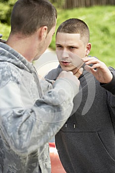 Two Young Men Fighting