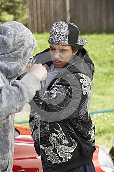 Two Young Men Fighting