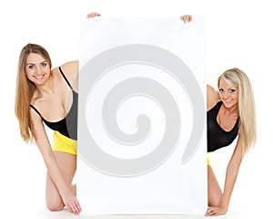 Young women with empty board for the text.