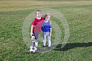 Two Young Soccer Players on the field