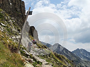 Two Young Tourists High in the Mountain