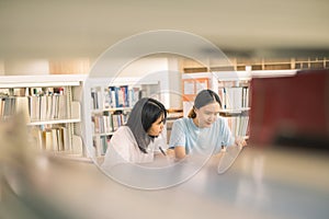 Two young woman, a dedicated student, navigates university life with her friend, embracing education and growth as they pursue