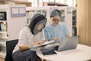 Two young woman, a dedicated student, navigates university life with her friend, embracing education and growth as they pursue