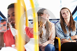 Two Young Women On Bus Journey Together