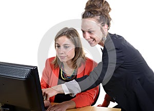 Two young women in office working