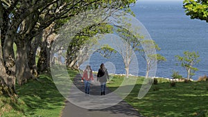 Two young women on their journey along the causeway coast in Northern Ireland