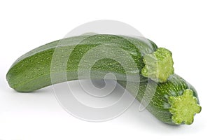 Two zucchini, white background