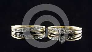 Twogold rings with gems