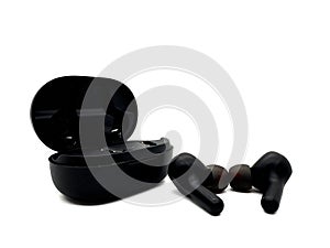 TWS True Wireless Earbuds in black with a white background. Close Up photo