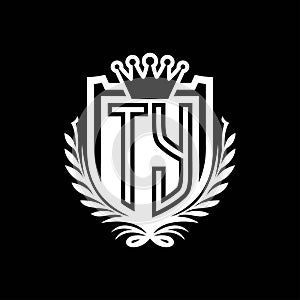 TY Letter logo heraldic shield shape with crown on black background template design