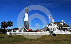 Tybee Island Light Station with the American Flag in the foreground