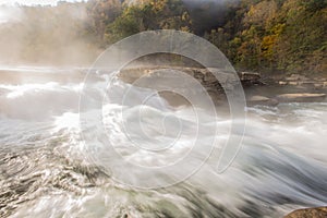 Tygart River cascades over rocks at Valley Falls State Park