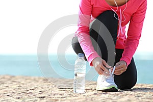 Tying shoelaces on the beach