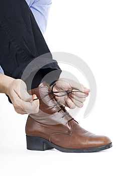 Tying shoes