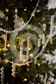 tylish glass crystal transparent toys on the Christmas tree. Beige tones. Banner for web page design. The concept of a