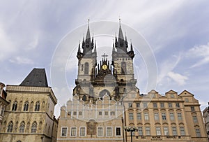 Tyn Church gothic style front facade on sunny blue sky sunset