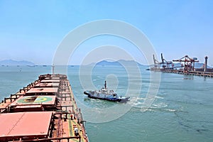 Type of cargo terminal and cranes, berths for transshipment of bulk cargo, iron ore and coal. Port Zhuhai, China