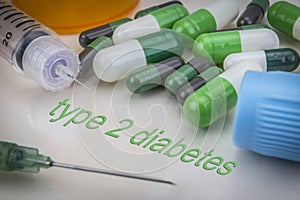 Type 2 diabetes, medicines and syringes as concept photo