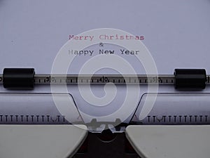 Typed Merry Christmas and Happy New Year photo