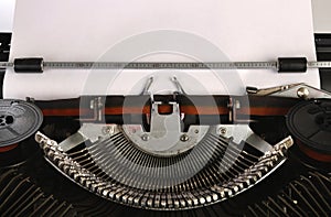 Typewriter With A Blank Sheet Of Paper