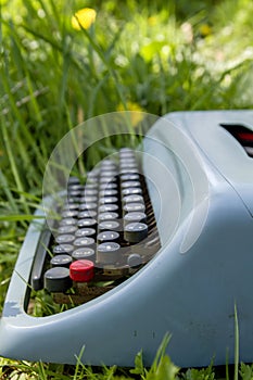 Typewriter on the grass