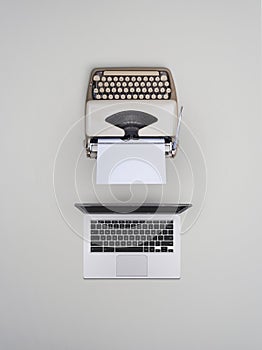 Typewriter and laptop old vs new