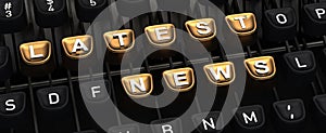 Typewriter with LATEST NEWS buttons