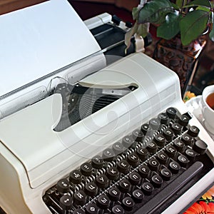 Typewriter on the old table