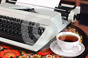 A typewriter and tea.