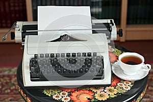 A typewriter and tea.