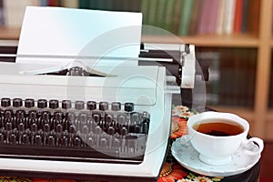 A typewriter and tea.