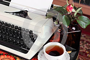 A typewriter and tea.