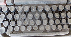 Typewriting keyboard covered by dust photo