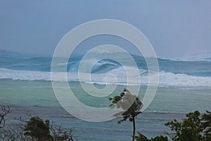 Typhoon in Southeast Asia. Strong winds and huge waves on the tropical island of Boracay Philippines