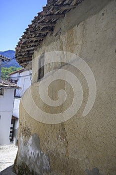 Typical adobe house with round bulge in Hervas