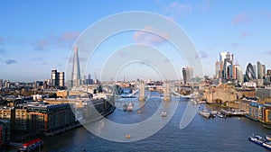 Typical aerial view over the city of London with Tower Bridge and River Thames