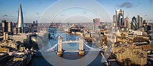 Typical aerial view over the city of London with Tower Bridge and River Thames