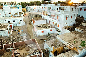 Typical African village houses facade. Medieval street