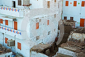 Typical African village houses facade. Medieval street