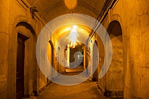 Typical aisle in aged courtyard in the old district of Saint Petersburg former Leningrad at night.