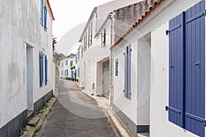 Typical alley and white houses in the center of Noirmoutier VendÃ©e France