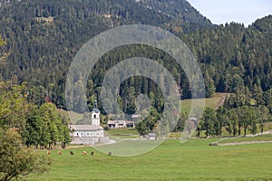 Typical alpine catholic church in Zgornje Jezersko, in Slovenia, at the border with Austria, in the julian alps mountain