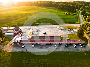 Typical American roadside motel. View from a drone at sunset